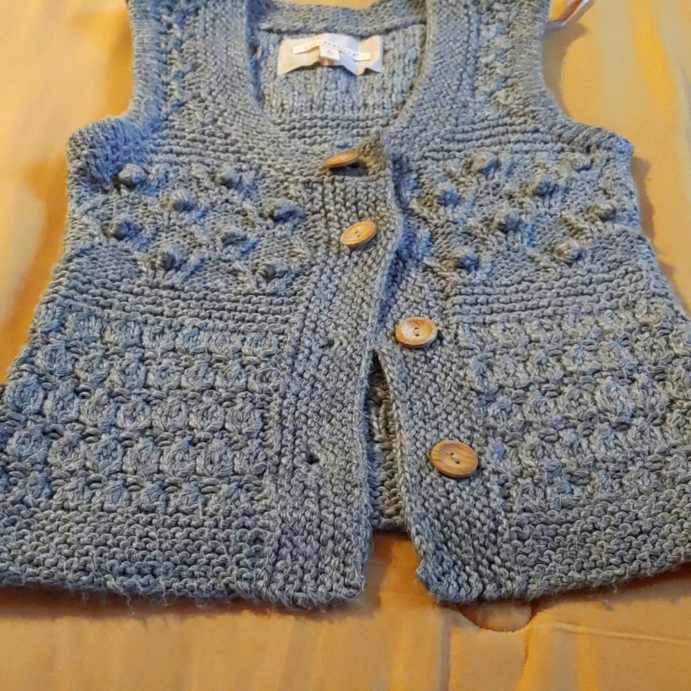 Women sweater vest low scoop neck. Grey. Wooden buttons